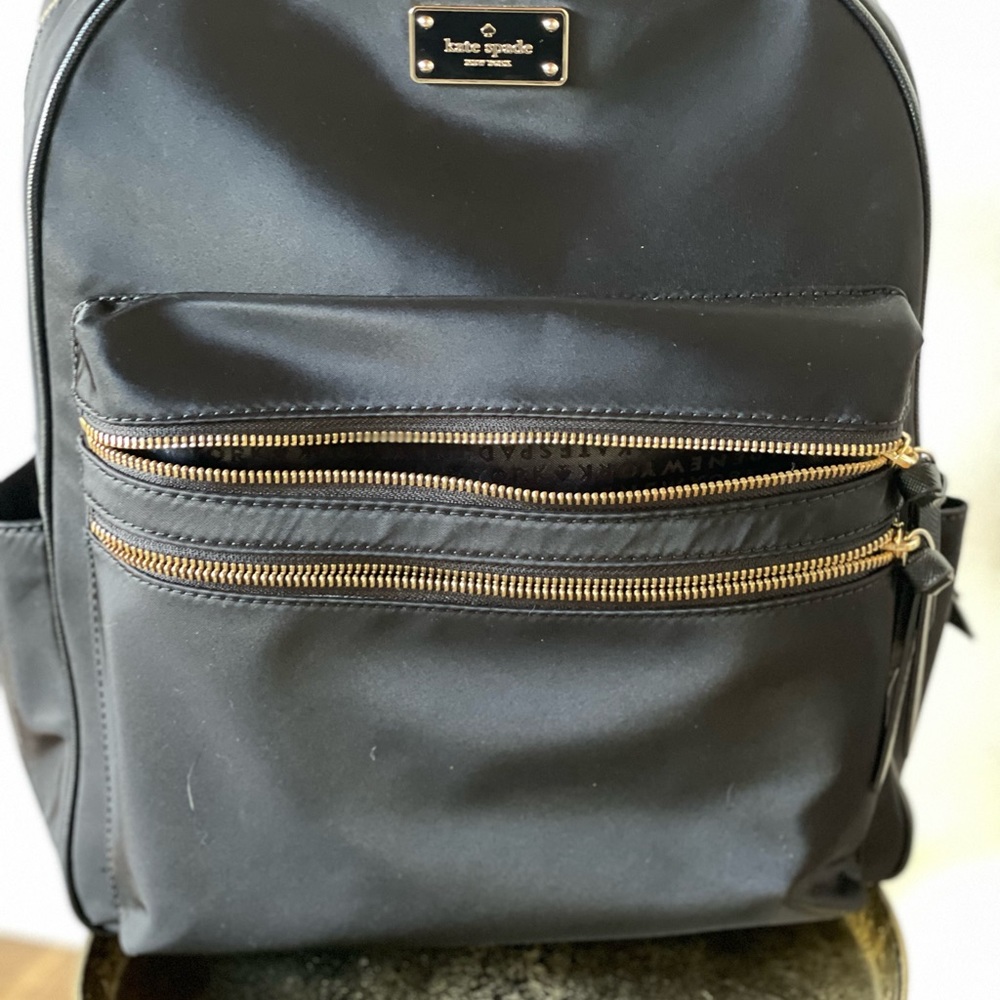♠️ large black multi pocket Kate Spade backpack.